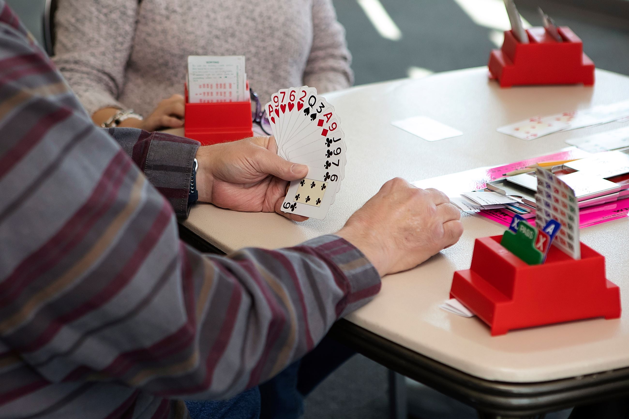 hand holding cards during a card game