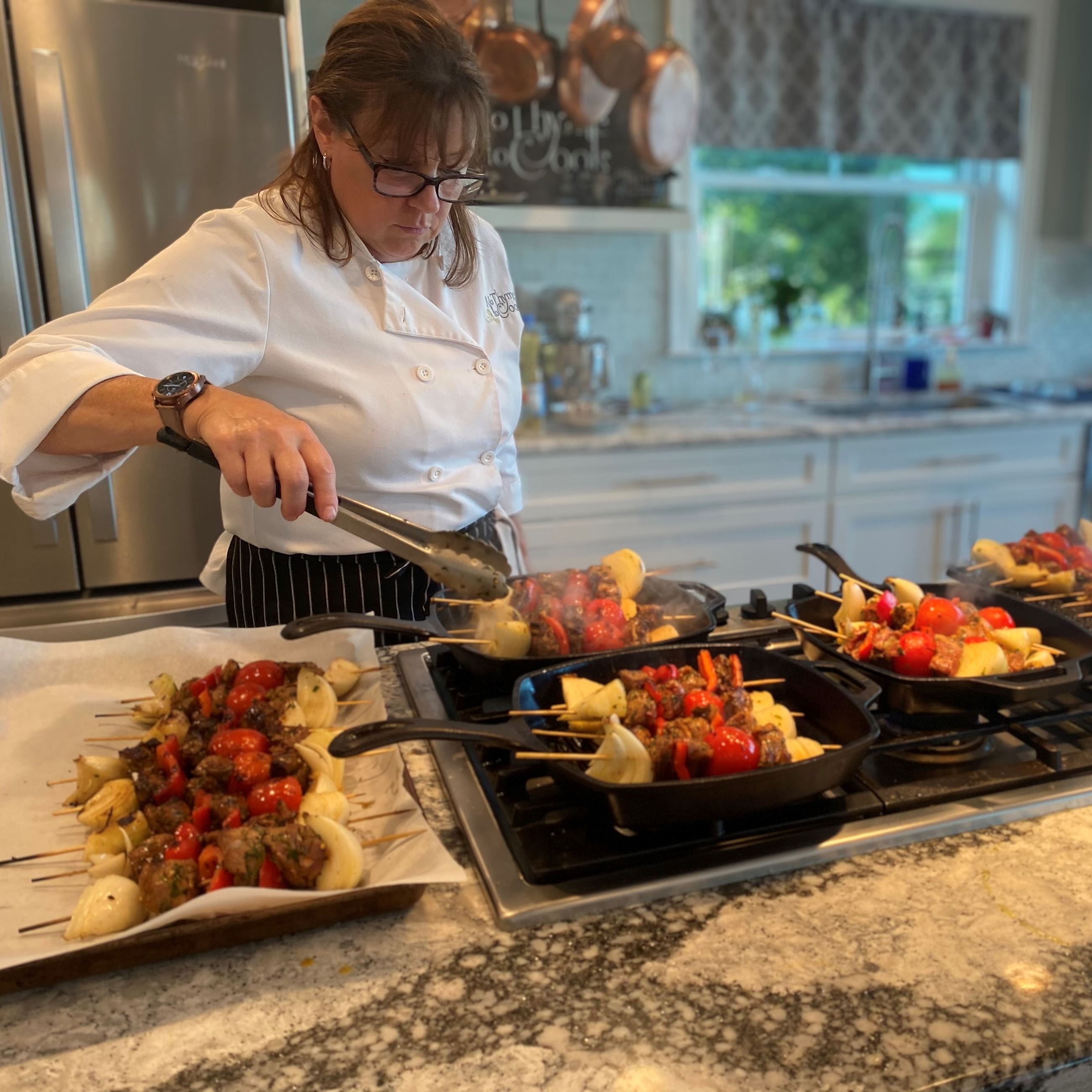 Woman cooking at No Thyme To Cook