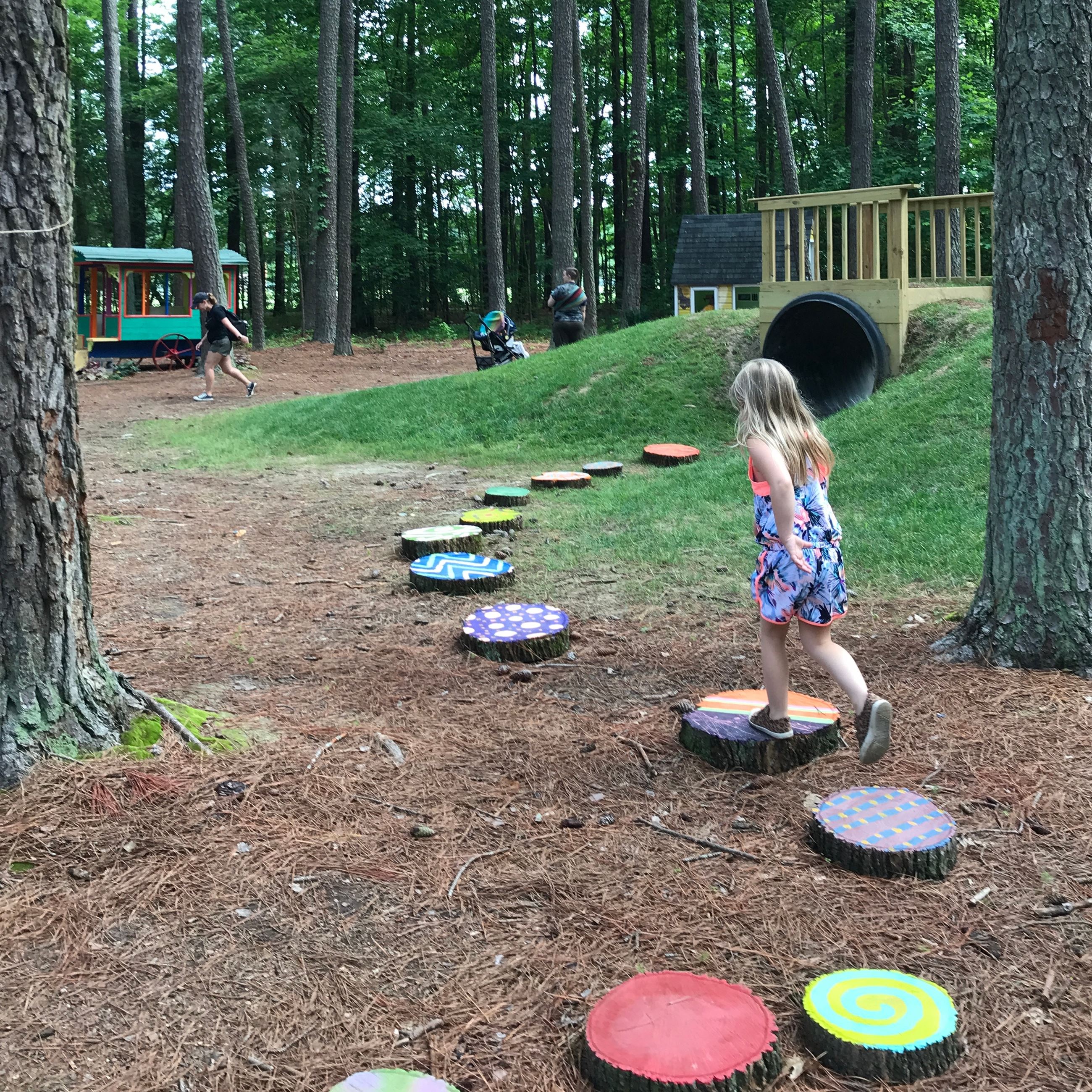 Kids playing in the play area at Annmarie Sculpture Garden